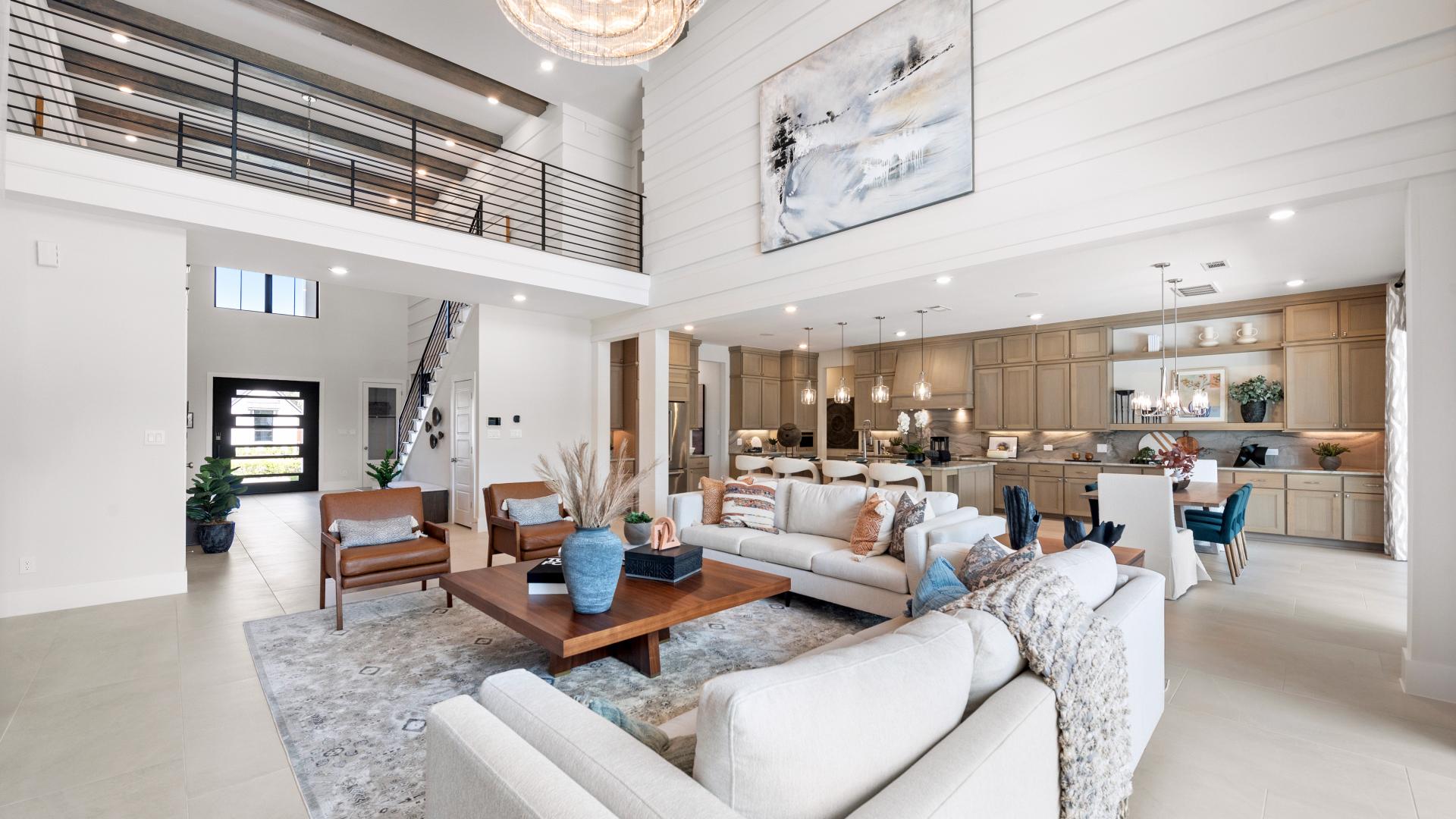 Open great room and kitchen of a new construction home for sale in Fort Bend County