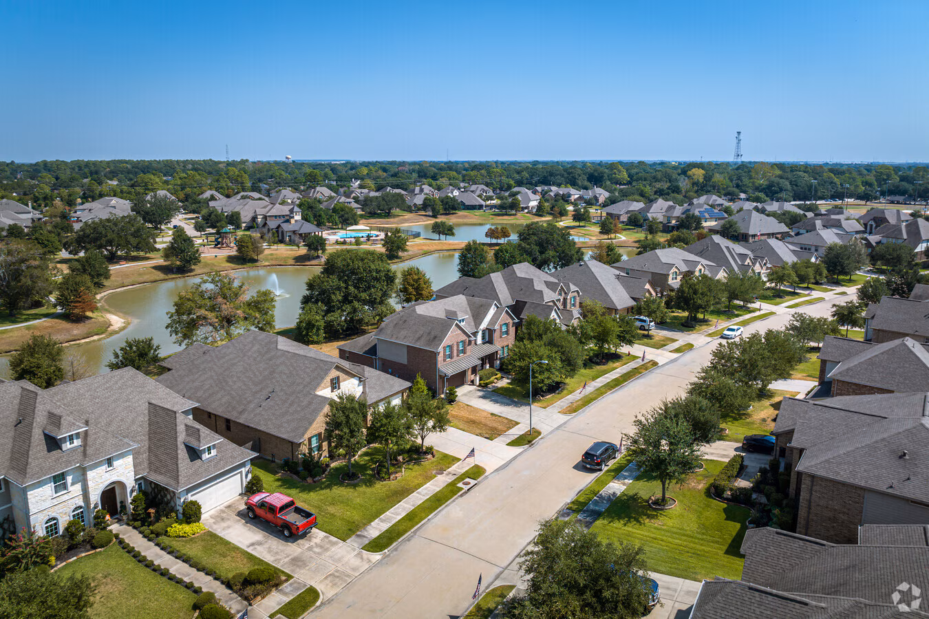 Aerial view of a lakeside master-planned neighborhood in Katy, Texas