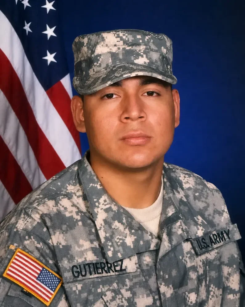 Miguel Gutierrez portrait — uniform, or with a veteran client